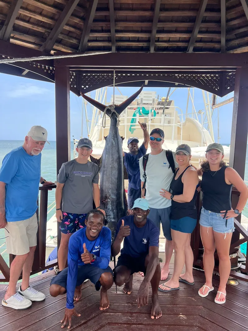 Group of anglers with a trophy catch aboard Vodka Shot in Jamaica