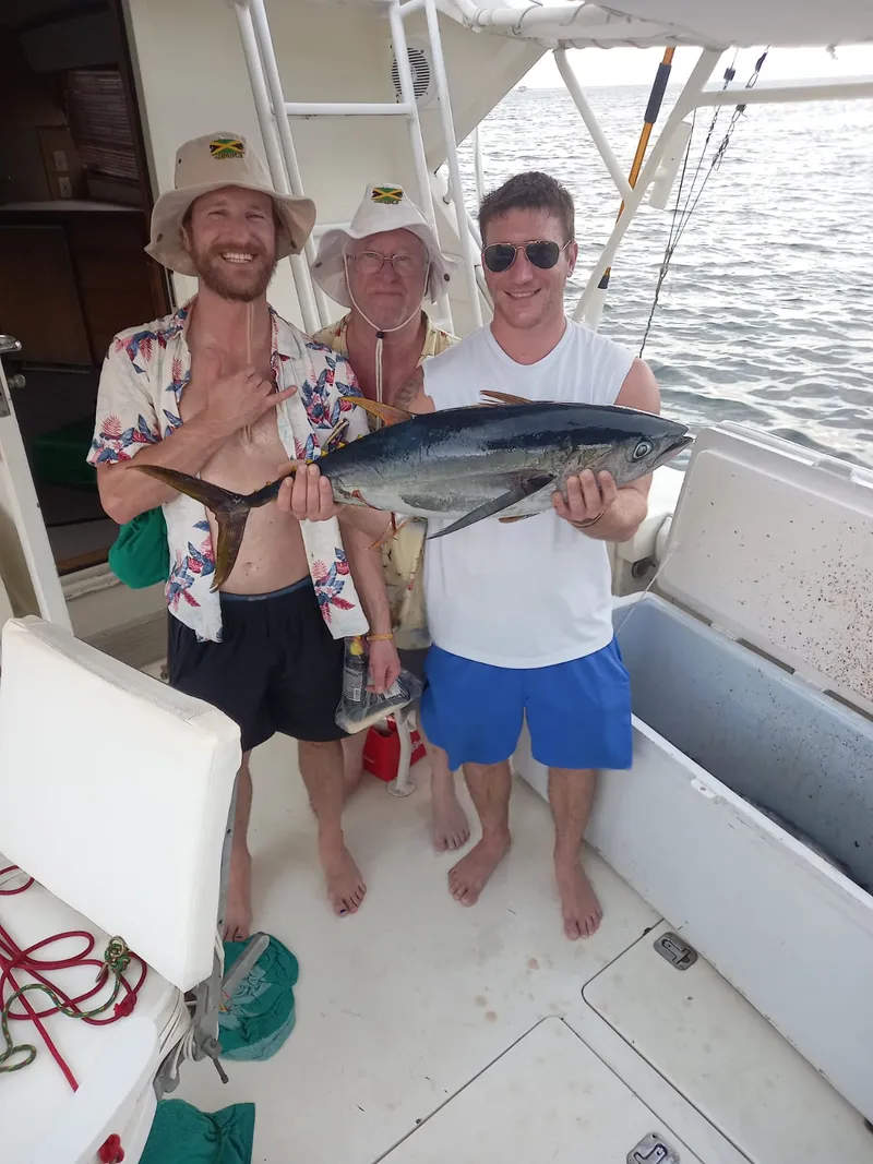 Anglers with yellowfin tuna caught aboard Vodka Shot in Montego Bay